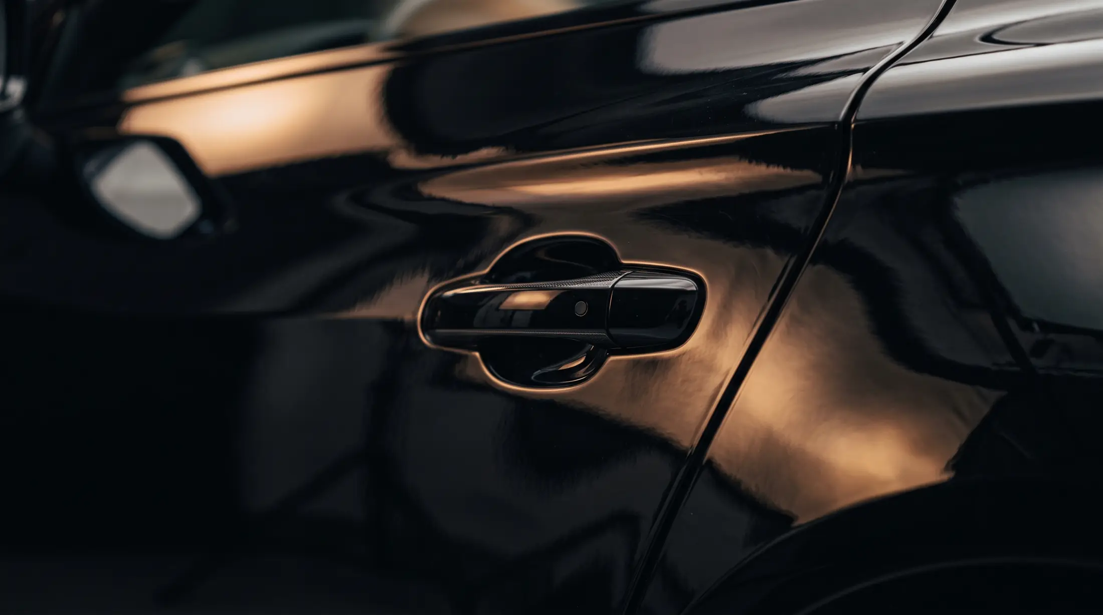 Detail of a chauffeur car under studio lighting
